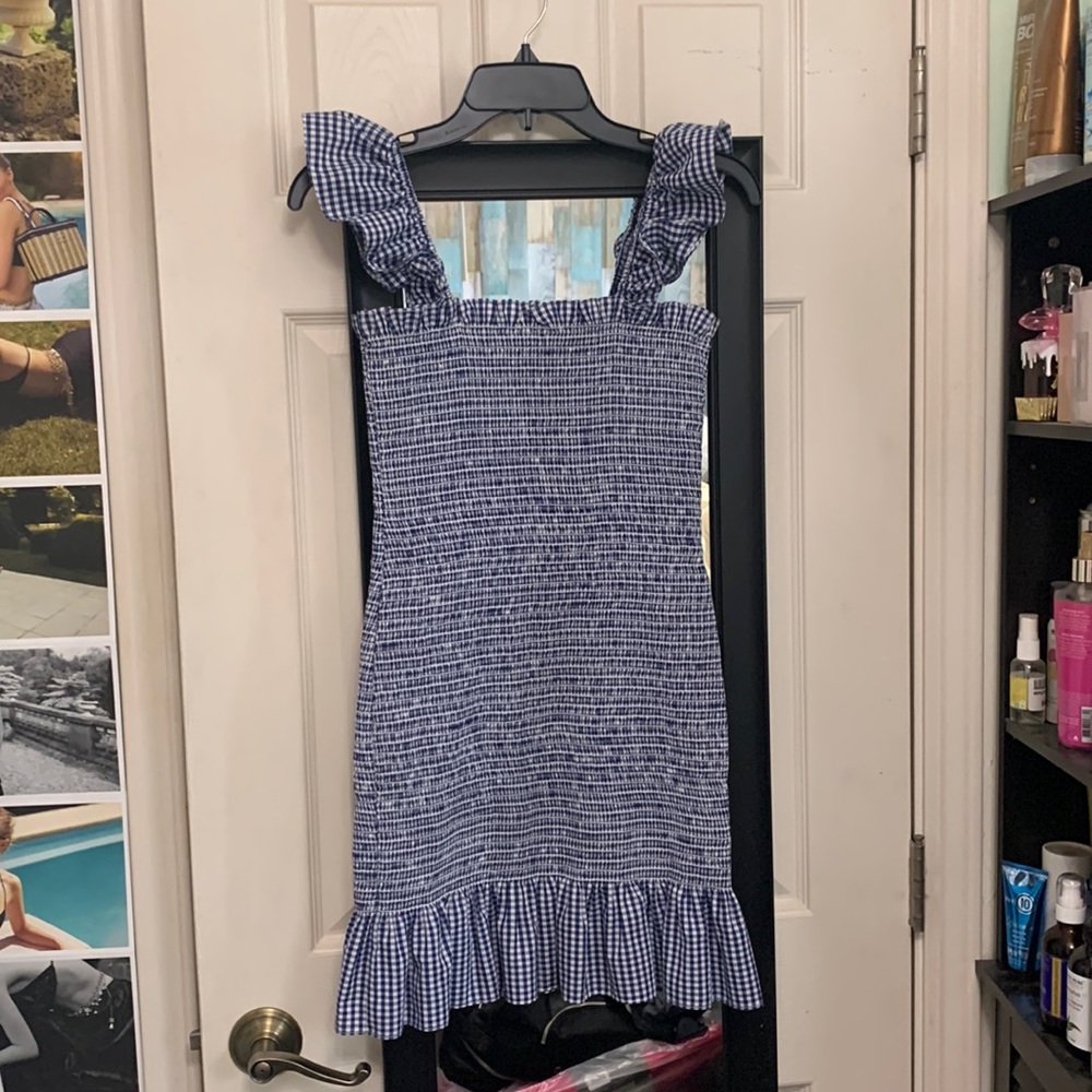 Form fitting ruffle dress by Barney’s